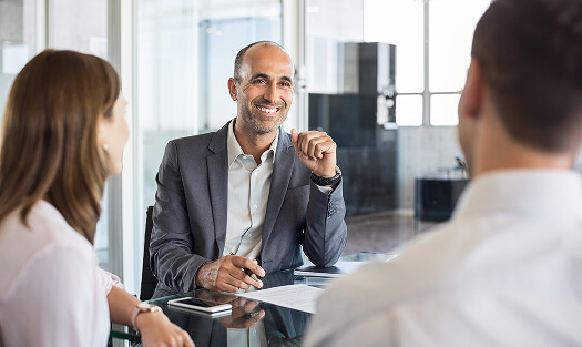 A group meeting around a table